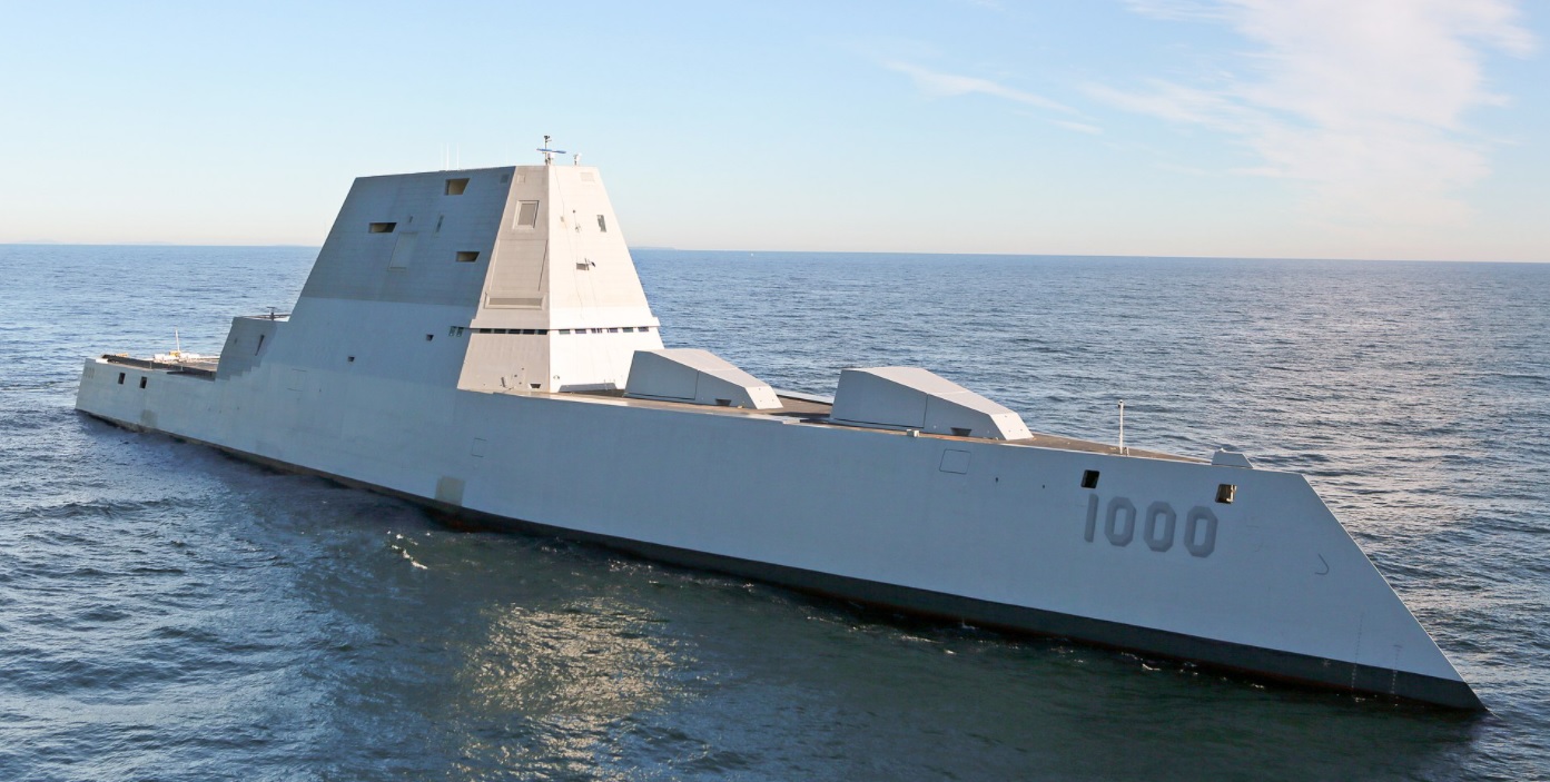 Large white military submarine floating on the ocean, number 1000 visible on the side.