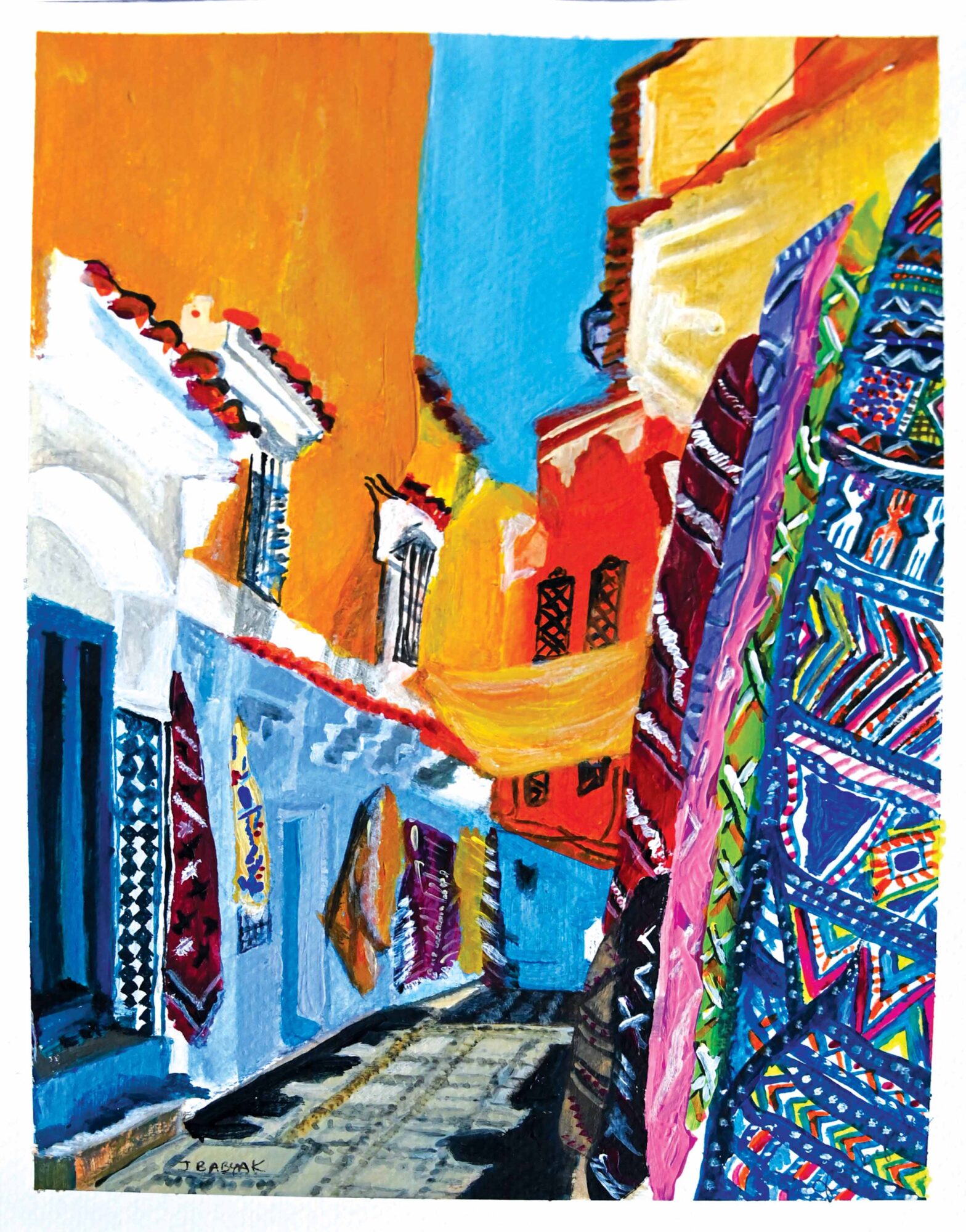 Colorful street scene with buildings and vibrant textiles hanging, viewed from a low angle, with a cobblestone street.