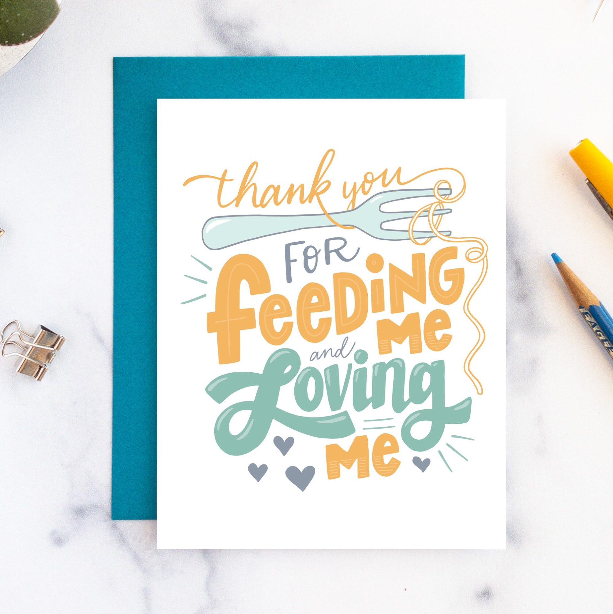 Thank you card with colorful hand-lettered message about feeding and loving, decorated with a fork and hearts.