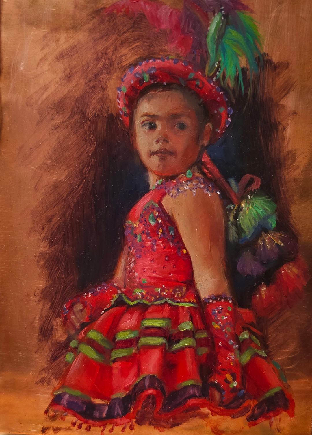 Child in colorful traditional costume with a feathered headdress, standing against a brown background.