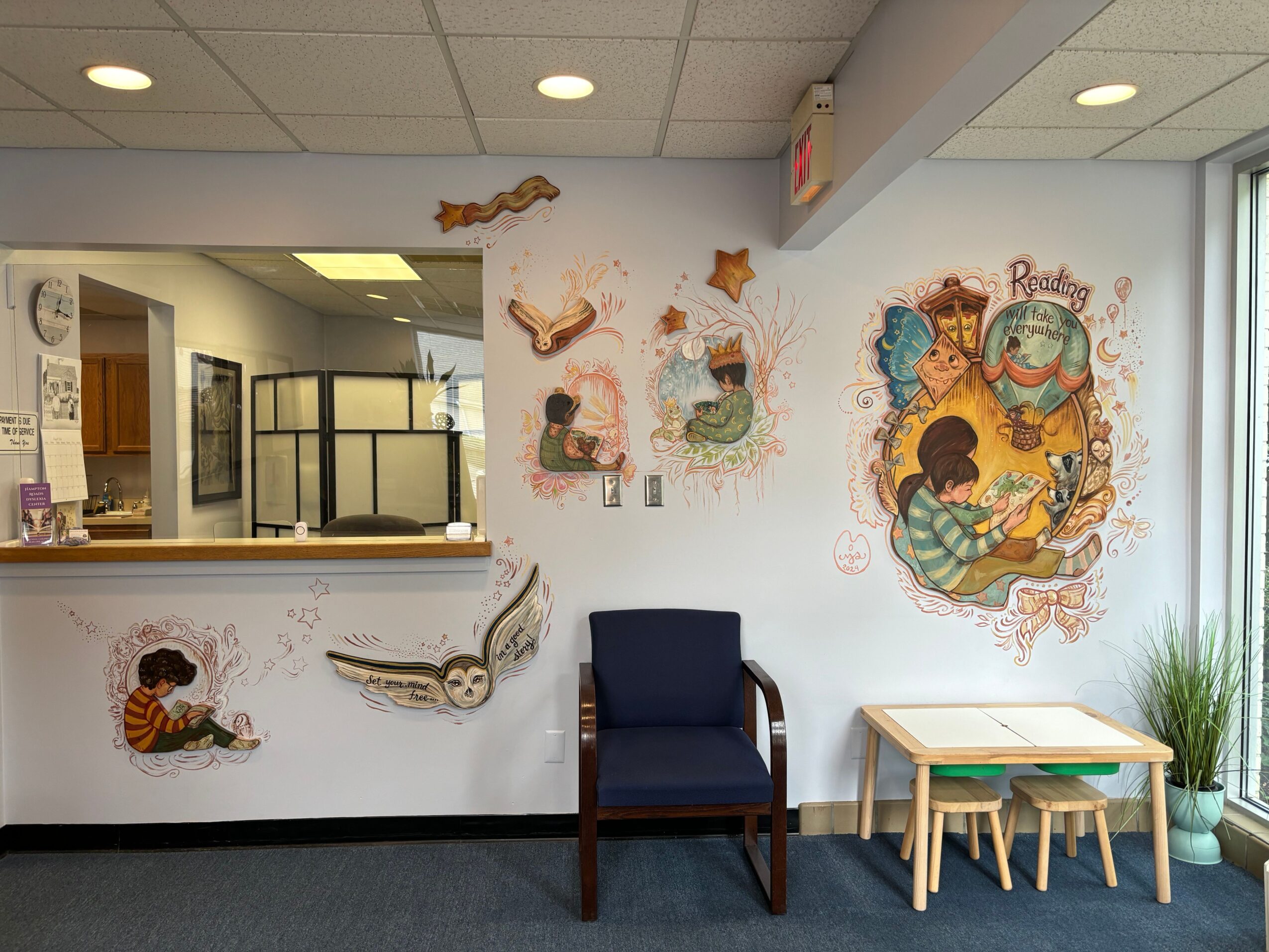 Interior room with colorful murals, a doorway, and a ceiling with hanging chairs, viewed upside down.