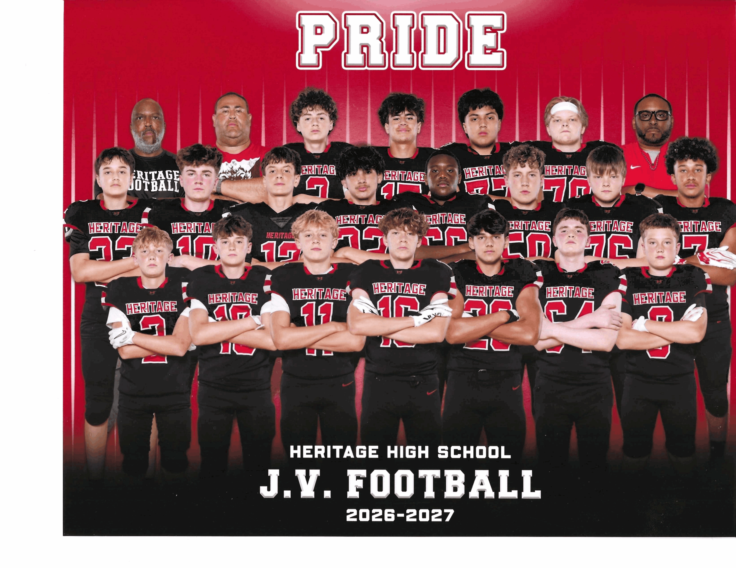 Group of football players and coaches in black uniforms with red accents, standing in front of a red curtain with 'PRIDE' banner, Heritage High School J.V. Football, 2026-2027.