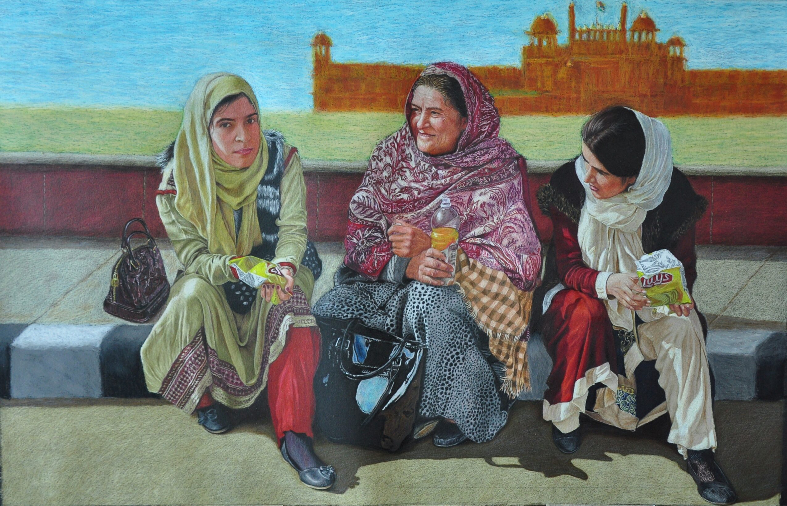 Three women sitting on a bench outdoors, with a building in the background, engaged in conversation and reading.