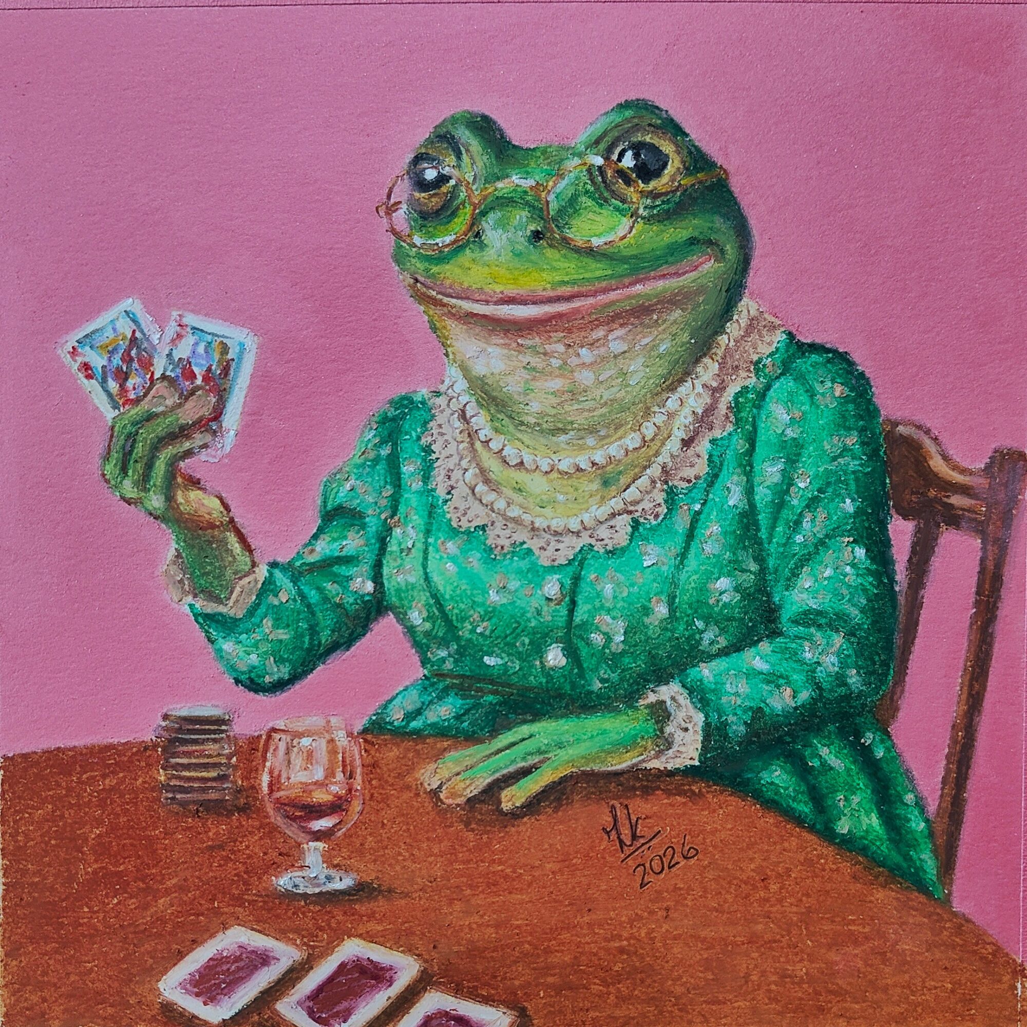 A frog dressed in a green dress with pearls, holding playing cards, sitting at a table with a glass of wine, pink background.