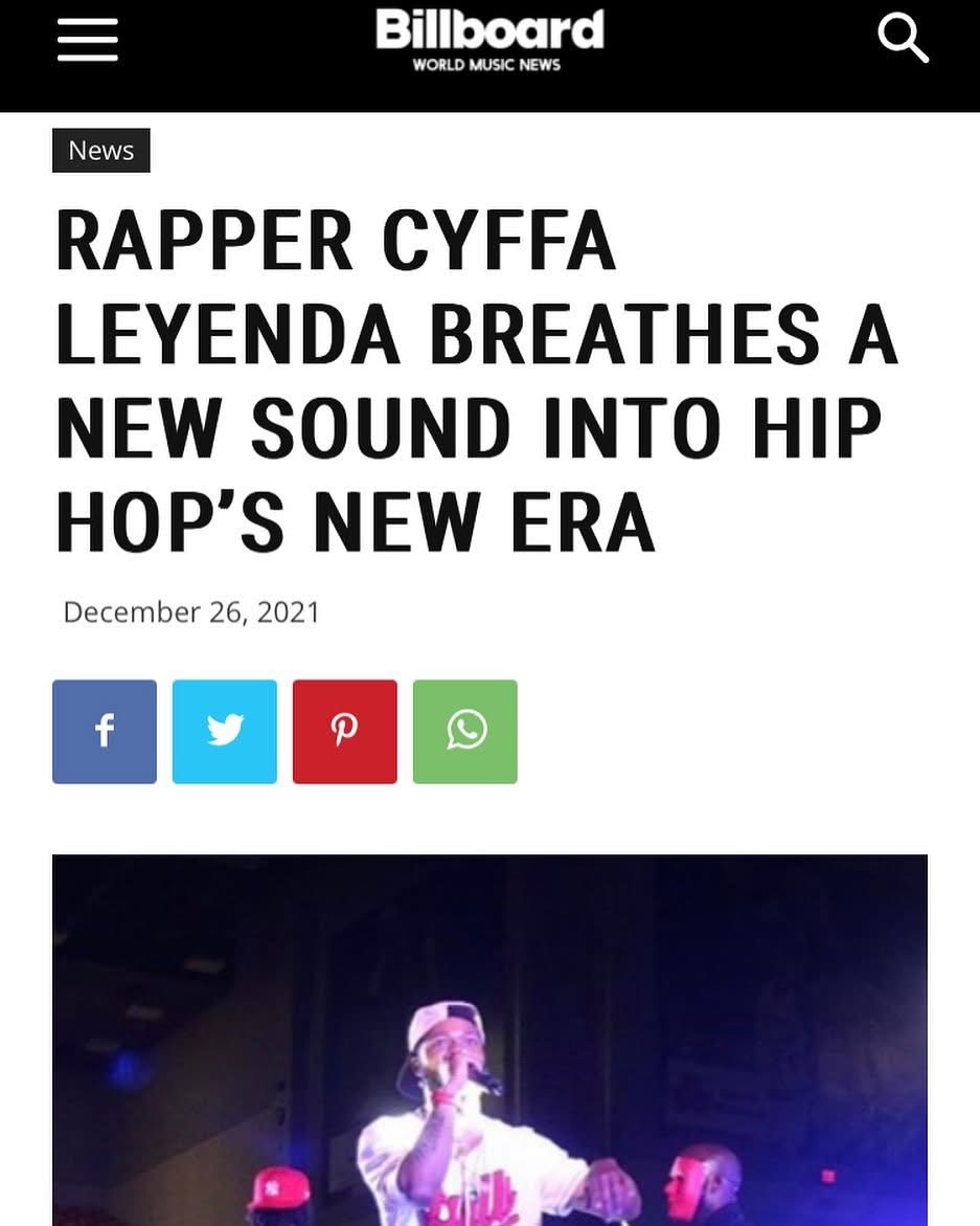 Screenshot of a Billboard news article about rapper Cyffa Leyenda, dated December 26, 2021, with a photo of a performer on stage.