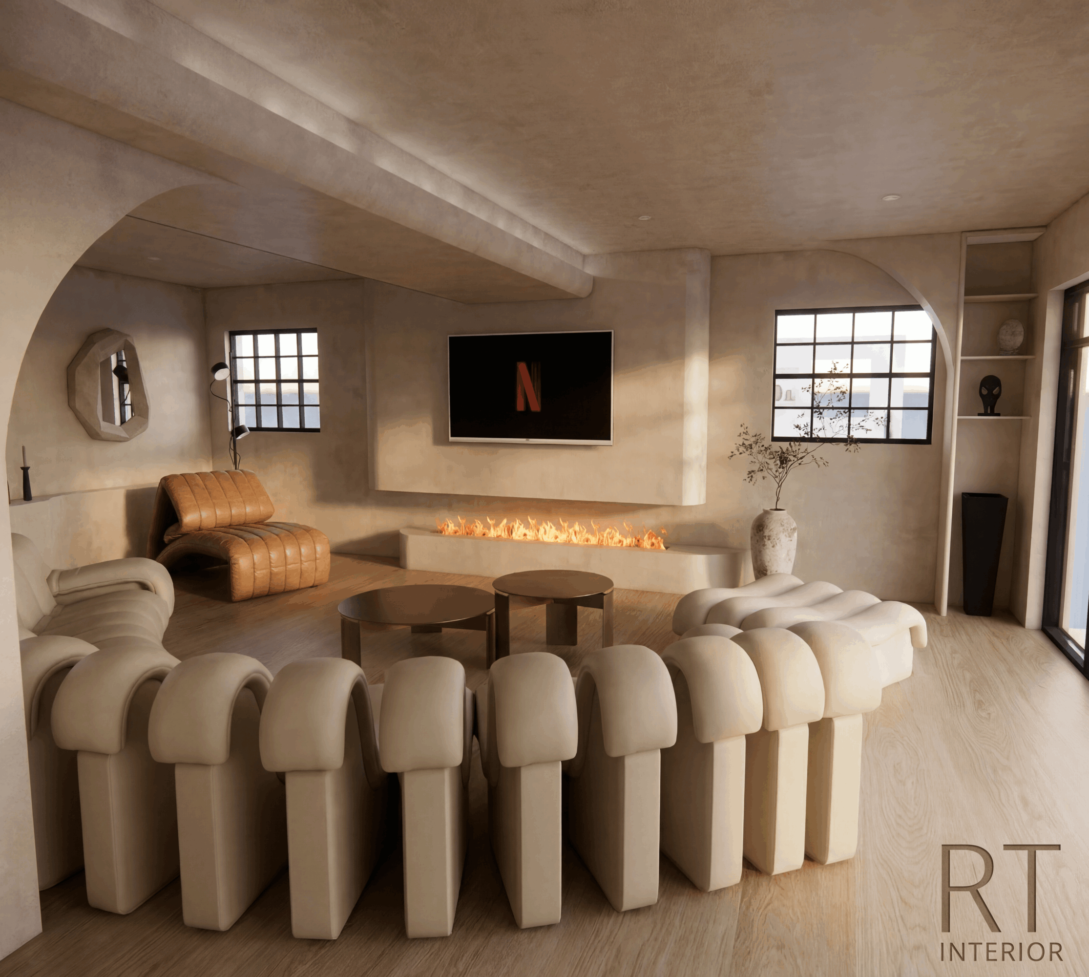 Living room with curved white sofa, wall-mounted TV, fireplace, and large windows, decorated in neutral tones.