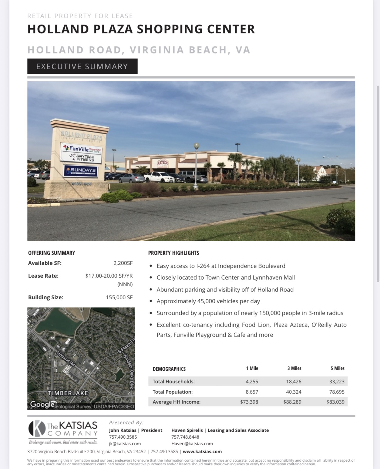 Exterior view of Holland Plaza Shopping Center with a sign, parking lot, and buildings under a blue sky.