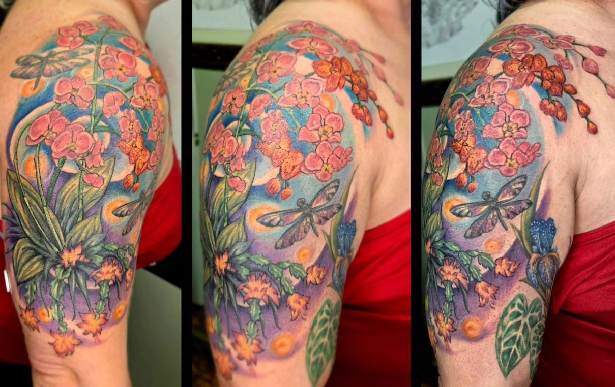 Colorful floral and dragonfly tattoo on person's shoulder and upper arm, with vibrant flowers and green leaves, viewed from different angles.