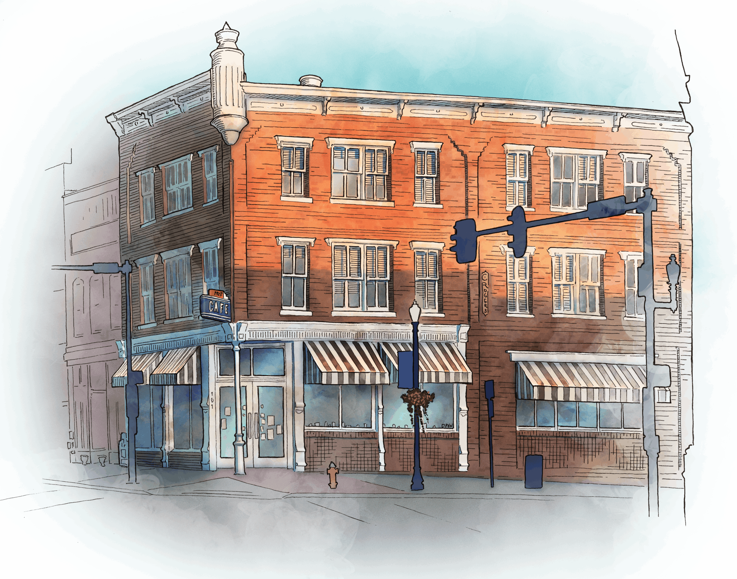 Three-story brick building with storefronts on the ground floor, awnings, and traffic lights in front.