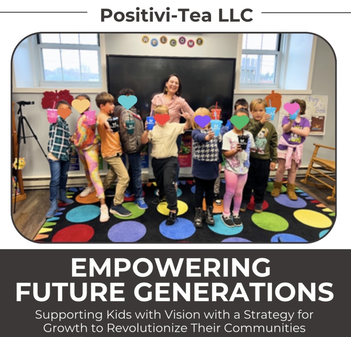 A group of children and adults pose on a colorful floor mat beneath a banner reading “Positivi-Tea LLC.”